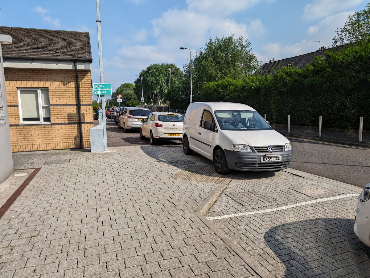 Why do I complain about the parking outside the spinal injuries unit at the QEUH? This is why. It's a different vehicle parked on the dropped kerb today but notice as well all the vehicles beyond it. They are parked in the ambulance bay. Every one of them is blocking access...