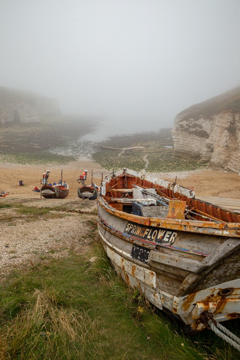 Flamborough north landing with the sea fret rolling in.