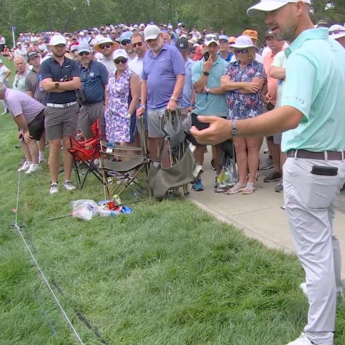 fried_egg_golf's tweet photo. Pretty egregious relief awarded to Brian Harman just now on No. 7. Claiming that he felt the rope would impact his through swing, he went from a buried lie in long rough (pic 1) to a perfect lie (pic 2) and nearly holed it https://t.co/K6LJvcV2hL