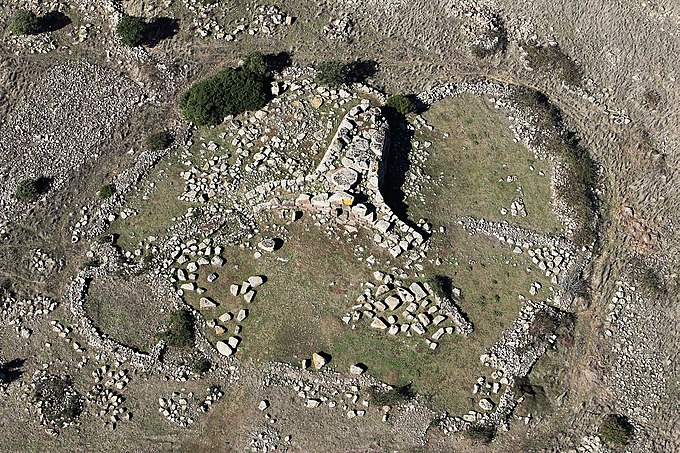 Giants' tomb (Italian: Tomba dei giganti, Sardinian: Tumba de zigantes / gigantis) is the name given by local people and archaeologists to a type of Sardinian megalithic gallery grave built during the Bronze Age by the Nuragic civilization. They were collective tombs and can be