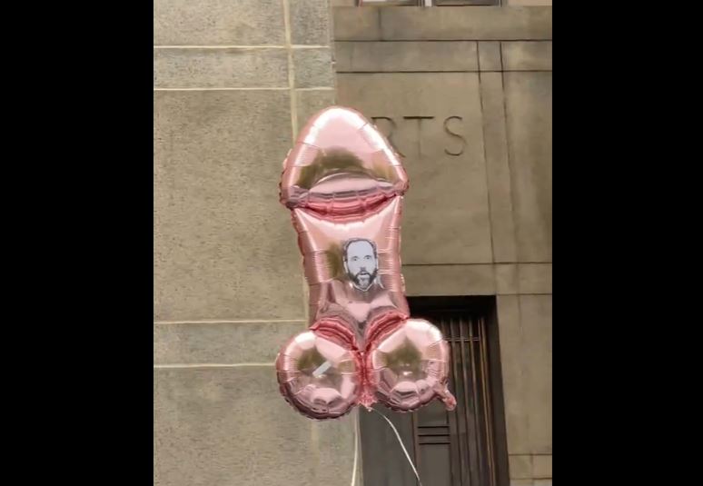 Penis balloon with Jack Smith's face floats through Manhattan. Should be Time Magazine photo of the year.