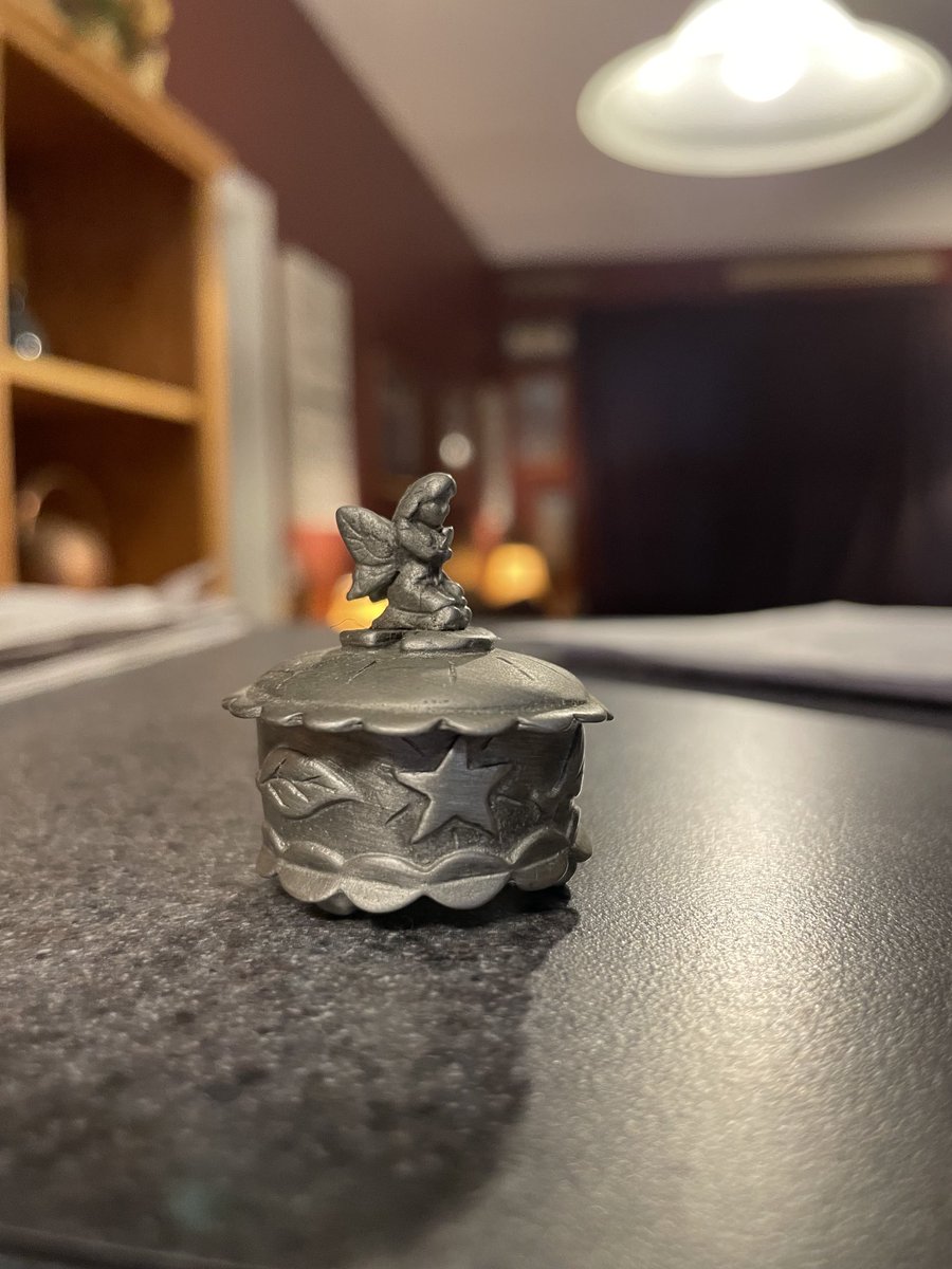 This cute little pewter angel holds my son's baby teeth. She has always lived in my vanity. I just retrieved her from my house.💜