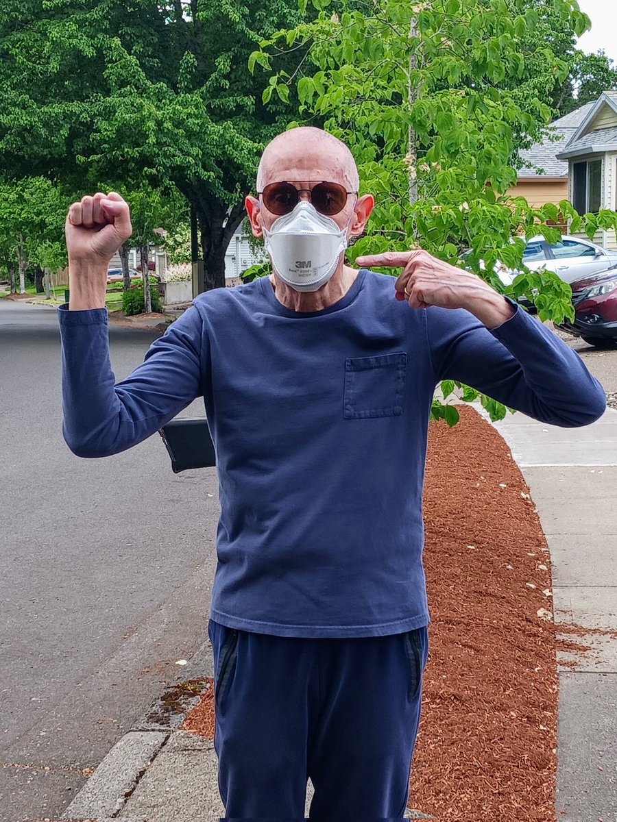 Out for a walk in the neighborhood, but taking no chances, because the unseen danger of uncontrolled Covid-19 is everywhere. Wearing a respirator mask to stay safe, continuing my lifelong habit of rebellion against the reckless masses.