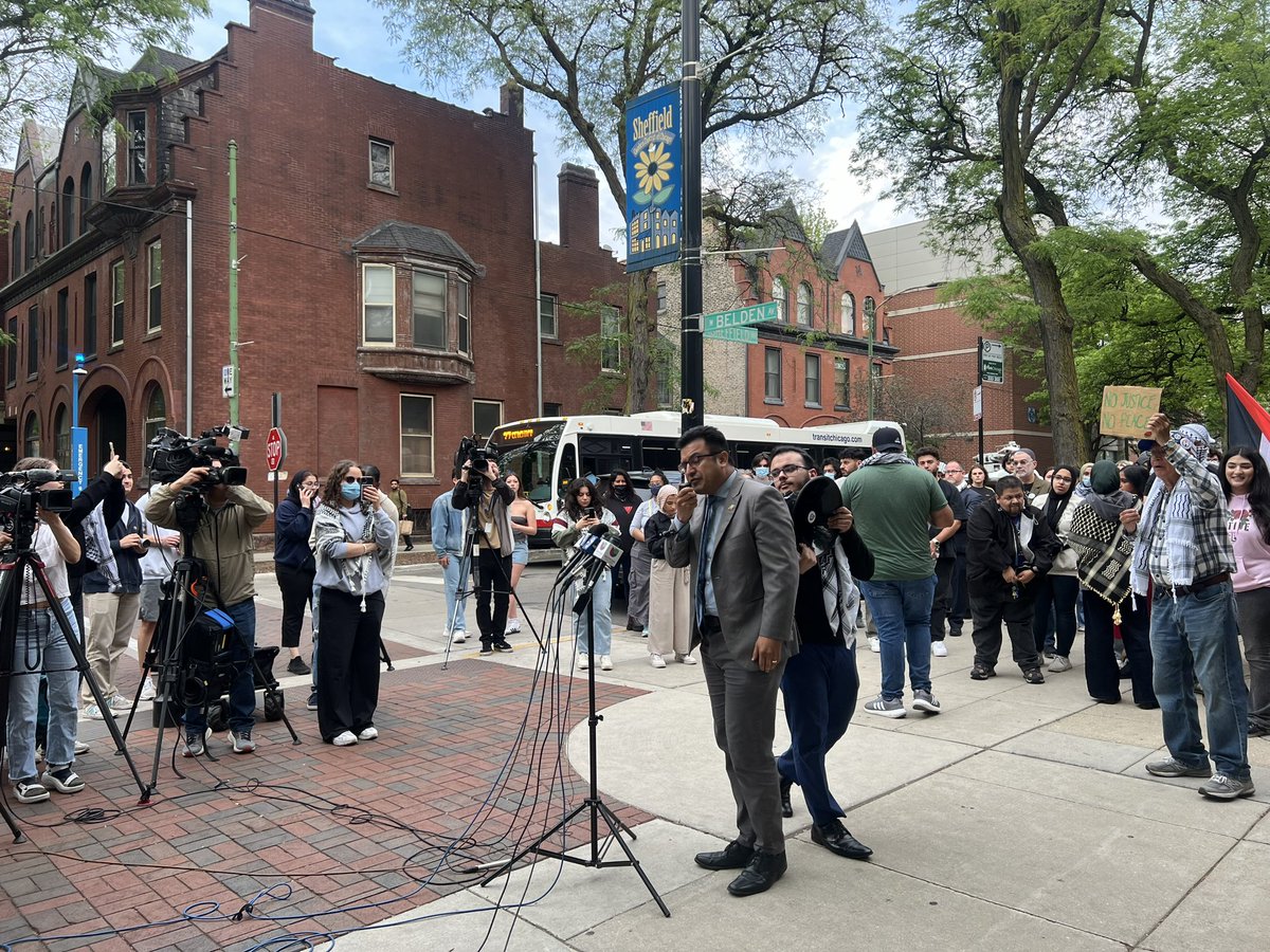 Ald. Byron Sigcho-Lopez (25th ward) gives a speech at the press conference in front of the Student Center: 

“This is a time of action and I will want to record the mission for the Vincentian values that are surveyed on the statue. What are we doing for justice?” @14eastmag