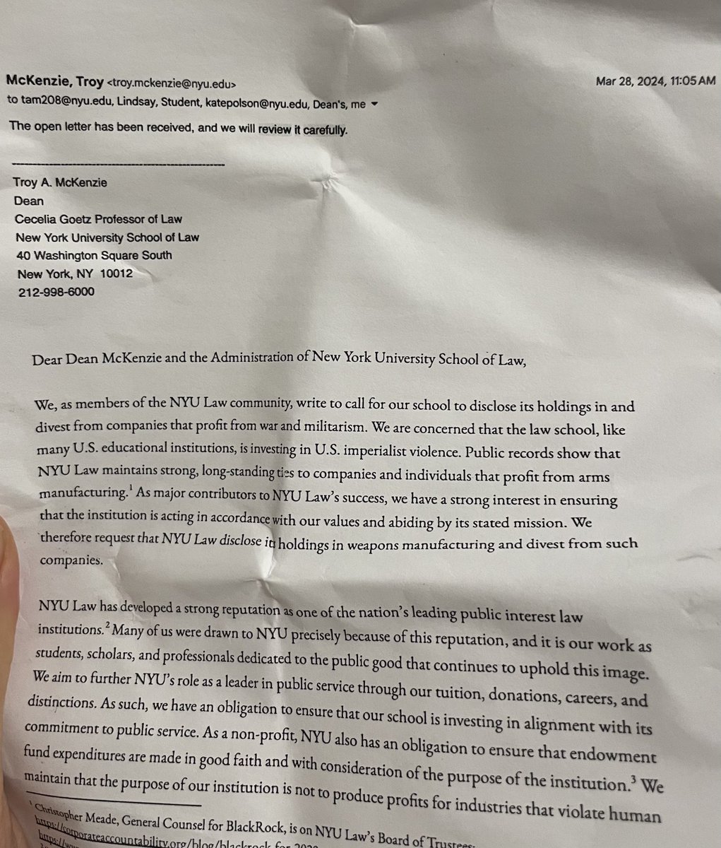 what people at nyu law graduation handed Dean McKenzie instead of shaking - a copy of students’ disclosure/divestment demand letter and the last email reply that the sjp received on the subject almost 2 months ago, radio silence since