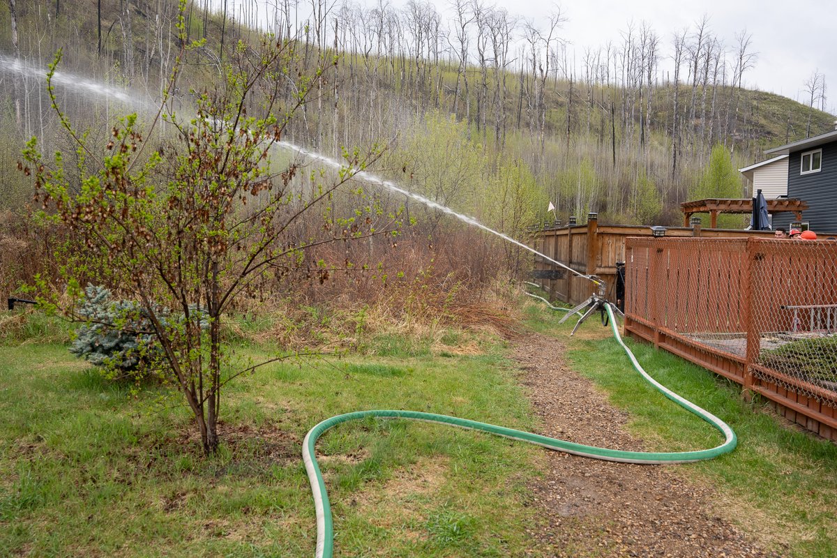 RMWoodBuffalo's tweet photo. May 16,  6:30 p.m. MWF-017 Update

Wildfire Information Update from Alberta Wildfire

MWF017 is classified as out of control at 19,820 hectares. The size reduction is due to a more accurate scan of the wildfire perimeter.

As of  p.m. today, the closest point of the fire remains about 5.5 km from the Fort McMurray landfill and 4.5 km from the intersection of highways 63 and 881.

There was limited growth on the wildfire today. Rain showers helped lower fire activity and allowed firefighters to make good progress. More rain is expected overnight and tomorrow.

Firefighters worked on building a containment line today and heavy equipment continued to work on fire guards to the southwest of Fort McMurray.

Heavy equipment will continue to work overnight. Three-night vision helicopters will also be dropping water on hot spots, if weather conditions permit.

There are 172 firefighters, 22 helicopters and 57 pieces of heavy equipment currently assigned to the wildfire.

Firefighters have completed structure protection in the Abasand, Prairie Creek and Beacon Hill neighbourhoods, as well as on the Rickards Landing Industrial Park, Gregoire Lake Estates and Gregoire Lake 176.

Information

The May 17 community update with Mayor Sandy Bowman, Chief Jody Butz and Information Officer Josee St. Onge is scheduled for 10 am tomorrow morning at https://t.co/aYDp6J9Q9l

Reminder: A fire ban was implemented on May 15 in the urban service area of Fort McMurray to mirror the fire ban and OHV restriction enacted within the Forest Protection Area by Alberta Wildfire.

Pre-suppression and structural protection efforts have completed 4.5km of ground applied retardant (168 000L) and laid 4.9km of 12” water lines with water cannons in interface areas and the highway corridor as of May 16.

Today, media were escorted by RMWB representatives through the evacuated communities to see first-hand, the response efforts by Alberta Wildfire.

For information for evacuees, including mental health resources, please visit https://t.co/rWvx7d4Aq7

Trusted sources of information

During an emergency, it is crucial to follow trusted information sources such as https://t.co/NC8v52IQQm and Alberta Wildfire.

For the latest evacuation alerts, visit https://t.co/rWvx7d4Aq7. For the most trusted and recent wildfire information, download the Alberta Wildfire App or visit https://t.co/9ARnO2YUiY.

#RMWB #YMM