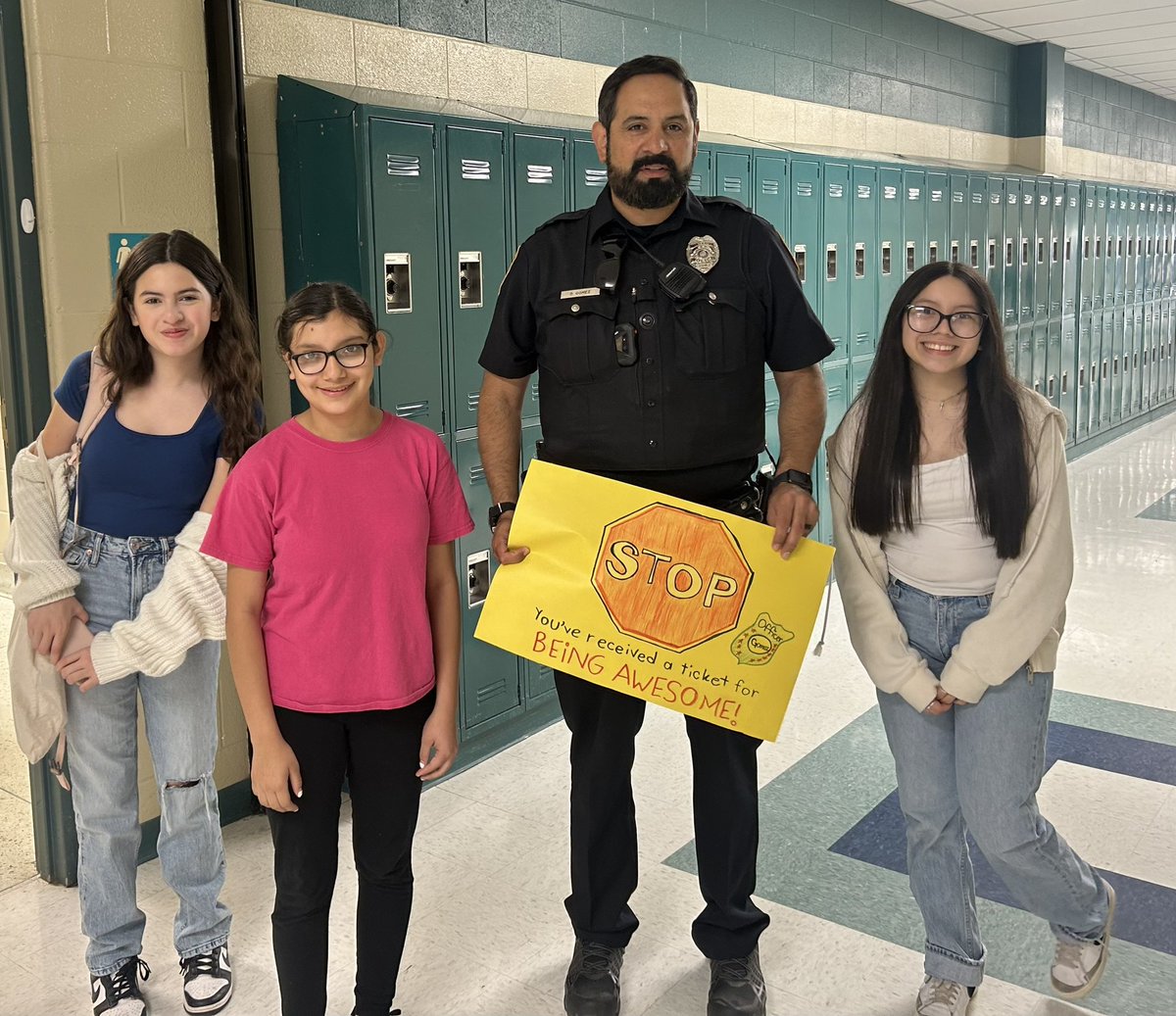 Thank you Officer 👮‍♂️ Gomez for keeping our campus safe @NISDStinson A few of our StuCo students wanted to 🛑 him and give him a ticket 🎫 for being AWESOME 😎 👏 #SkyhawkPride #TeamMedina