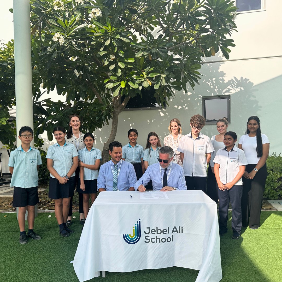 🌍✨ Jebel Ali School proudly signs The Alliance for Sustainable Schools Charter! Principal Mr. Jodrell, student leaders, Mr. Smith, Mrs. Moore, and Mrs. Barker commit to a greener future. 🌱💚 #jebelalischool #taaleem #dubaischools #TASS