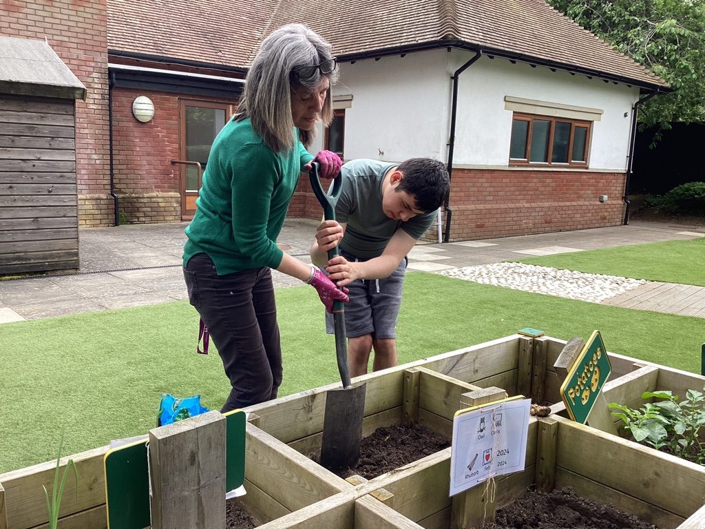 Working hard in our sensory garden and taking time out for a break and a chat. Oh and of course wearing green for #MentalHealthAwarenessWeek2024 #MeaningfulMoments