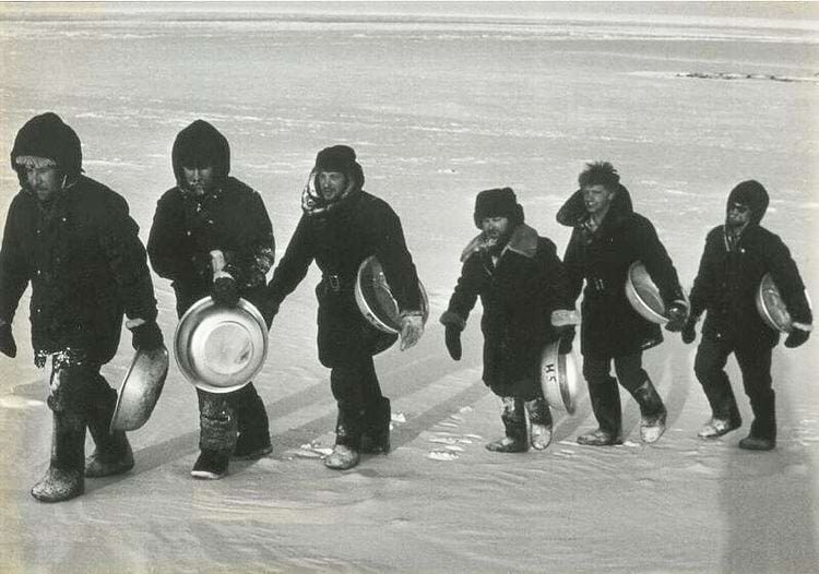 Soviet polar explorers going to the bathhouse. Photo by Vladimir Volkov, Zhokhov Island, 1984.
