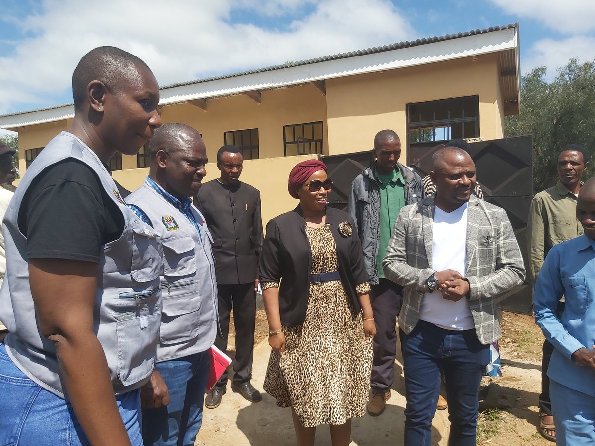 The Hanang District Commissioner Hon. Almish Hazali (in specs) flanked with @Actionaidtz Country Director Mr. Bavon Christopher at the RHS of RC after the Hand over event of WASH facilities for Ganana Sec School, Qedang'onyi and Jorodumu Primary schools in Hanang. @Startnetwork