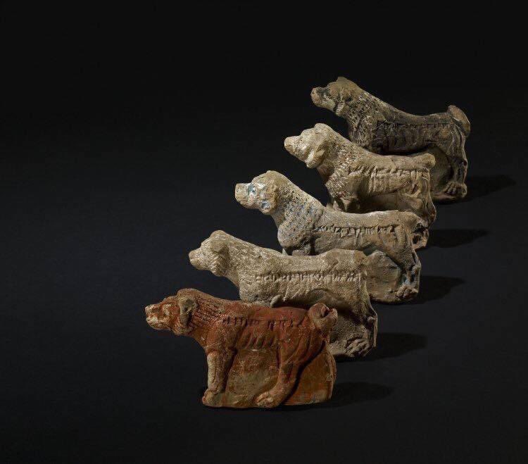 Assyrian dog figurines with names carved on them, 650 BC. 

'Who casts out evil.' 
'Trapper of the enemy.' 
'Don't think, bite!'
'Bite the enemy!'  
'Bark loudly!'
