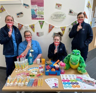 These lovely ladies from the @NHSGGC Childsmile Oral Health Team who have set up a toothbrushing and nutrition stand as part of @smilemonth. With thanks to Lynsey Ann, Shakira, Jaclyn and Lauren and your fabulous smileys 😃 #Childsmile #oralhealth #smilemonth #NHSGGC