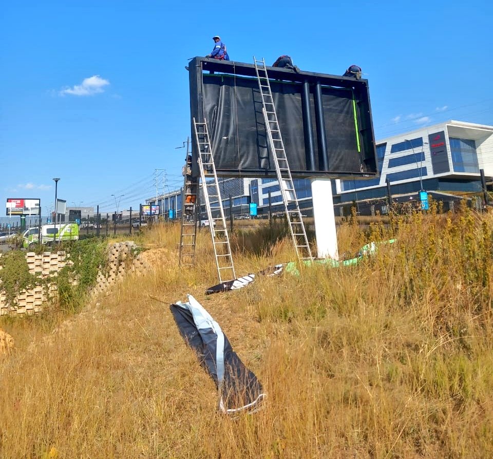 Caught Red-handed! A male was found illegally erecting an advertising sign without proper documentation at Allandale & Waterfall drv in Waterfall. #JMPD BMU unit officers instructed him to seize operations. 3 step ladders & 2 banners were impounded. Impoundment notice issued.