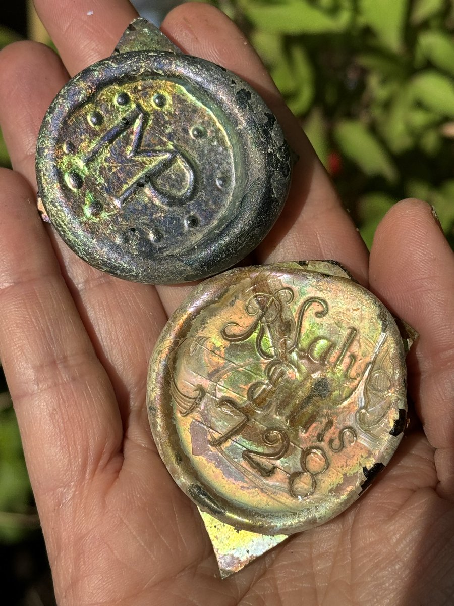 Treasured possessions. Two wine bottle seals. 17th and 18th century (1728 to be exact).  Iridescent from the mud. Bearing the initials/names of long gone Londoners.  I have yet to identify R. Adult or Saly of 9 Elms. Found #mudlarking on the #thames