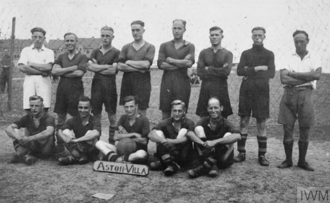⚽📸A group photo of 'Aston Villa' football team, made of British POWs at the Stalag XXID, Poznań (Posen). Football was a popular form of leisure for British POWs. S️ource: © IWM (HU 9282)