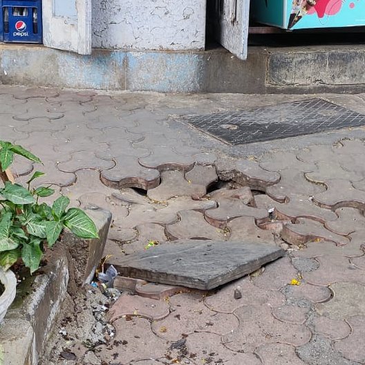 The_val_Sha's tweet photo. Footpath outside Meher Cold Drink House, Makawi Mansion, Junction of Rustom Sidhwa Marg and Saiyed Abdulla Brelvi Road, Fort is in dilapidated condition causing inconvenience, losing balance and fall. Please attend on urgent basis. @mybmcWardA @mybmcWardA @CMOMaharashtra https://t.co/CM2a2MDwtc