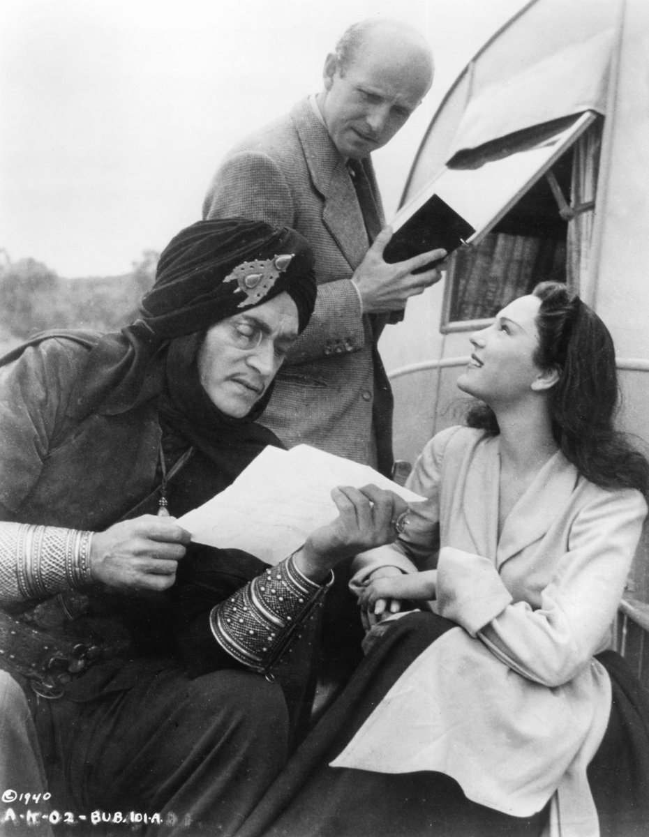 Conrad Veidt and June Duprez with co-director Michael Powell during the shoot of THE THIEF OF BAGDAD (1940). Photo preserved by #BFINationalArchive. 
Film showing today on #35mm @TIFF_NET as part of @BFI's #PowellAndPressburger season tiff.net/events/the-thi… #FilmOnFilm