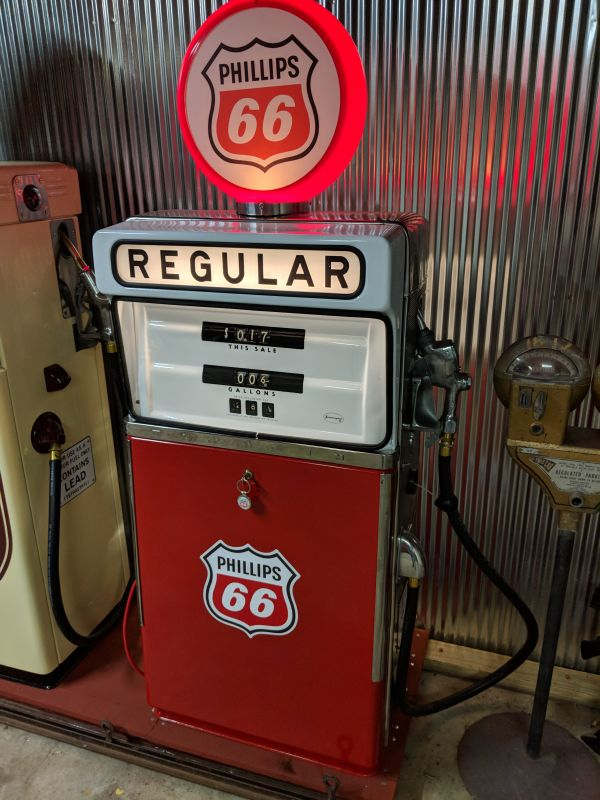 TF2DevTrivia's tweet image. Although the Engineer's dispenser is commonly believed to be based on an old-fashioned cigarette vending machine, its design is more directly inspired by that of a Tokheim 452 gas pump.