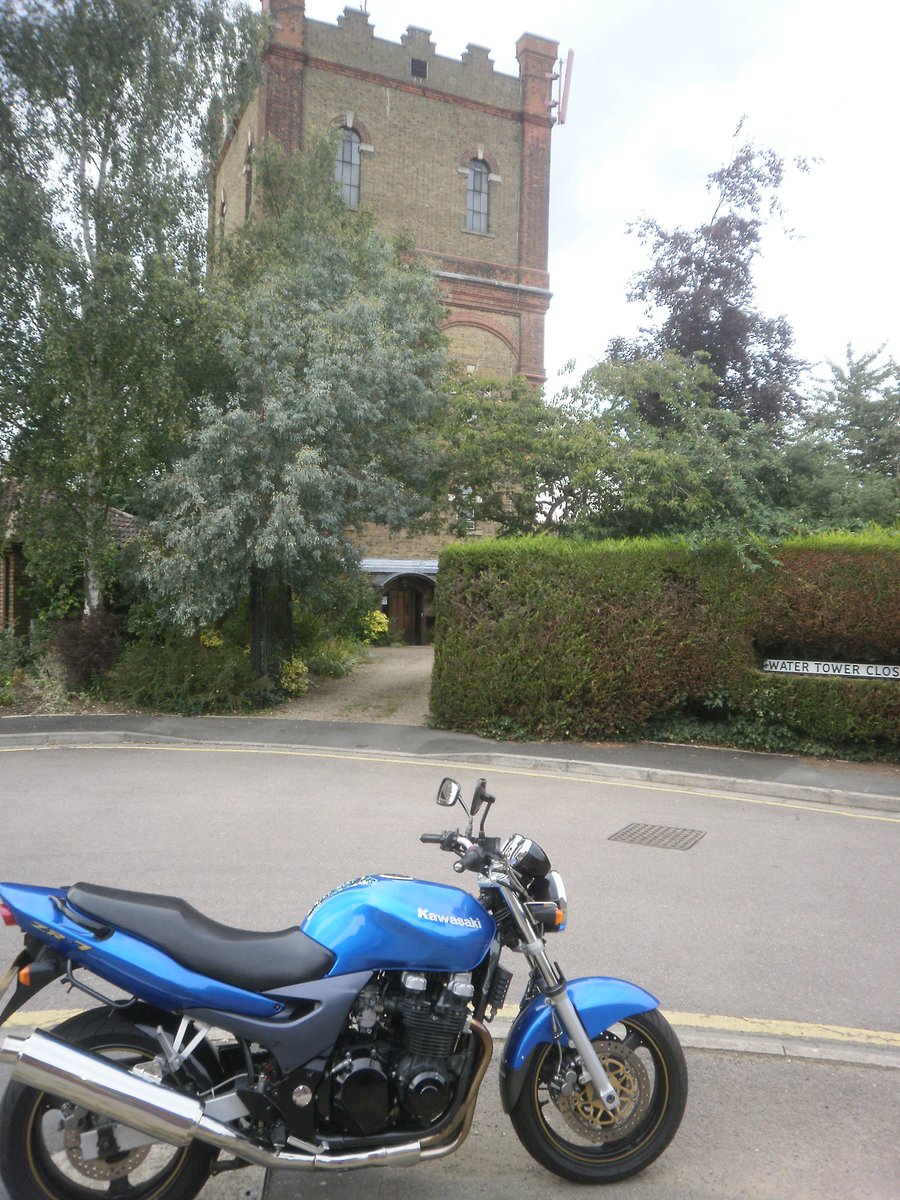 Good Friday @TotalMotorcycle motorcycling motorcyclist motorcycle riding bike riders! 🏍️ Photo: My Kawasaki ZR7-F 750cc in the UK I owned. It's a water tower I'm in front of turned into a home.