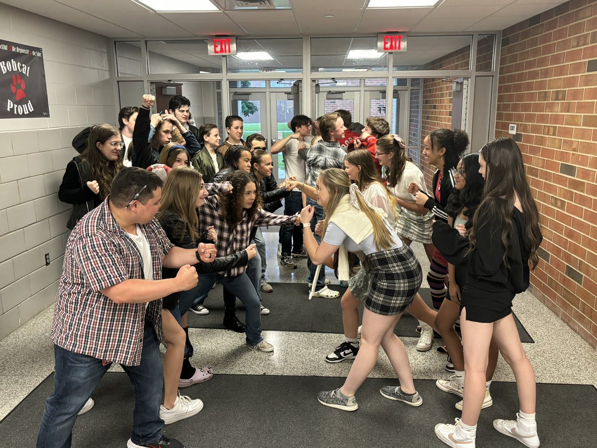 8th grade ELA is finishing reading The Outsiders by S.E. Hinton and dressed as Socs or Greasers to celebrate. 

The 1960’s fit look good on these kids!
