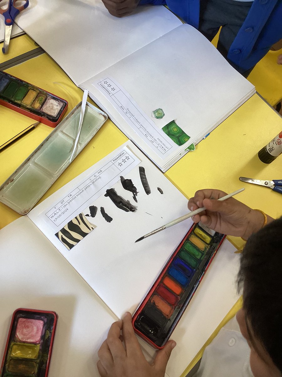 Year 1 are practising animal prints using water colours in our Earth Art topic this afternoon.