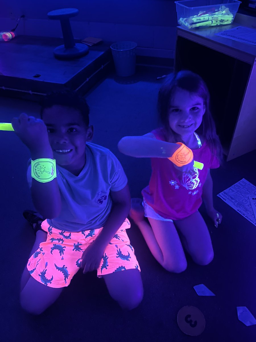 Mrs_Wood_LR's tweet photo. Wrapping up our first grade review and Glow Week with a Disney Day! We’re traveling to different locations, solving math problems and having a blast. #glowweek #disneyday #JCSTechLeads #lakeridgeelementary https://t.co/rCegVZzErE
