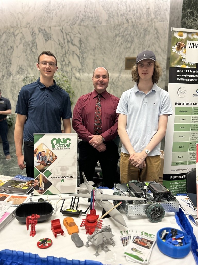 Dave Morell, New Visions Engineering Instructor &amp; students Izaiah &amp; Vincent represented the Engineering program at the BOCES Expo in the NY State Legislative Office Building. They showcased our program's value to state leaders among 30 BOCES exhibits.