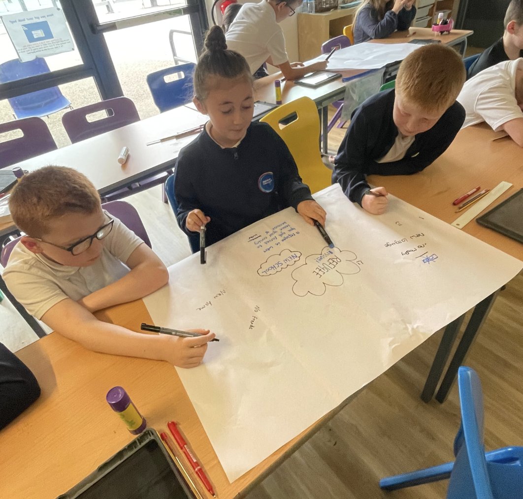Year5CCPS's tweet photo. This week, we have started our new persuasive speech unit. We read a story about the experiences of refugees and carried out research. We created mind maps and presented them to each other. https://t.co/Q7J8SqEcTA