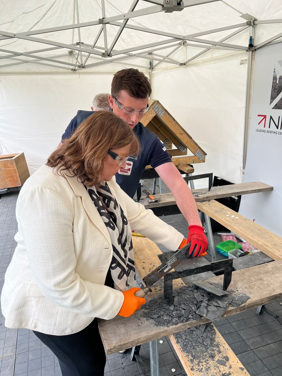 Slate cutting - one of the vital traditional building skills on display at an exhibition at the Scottish Parliament this week - great to get a hands on try!