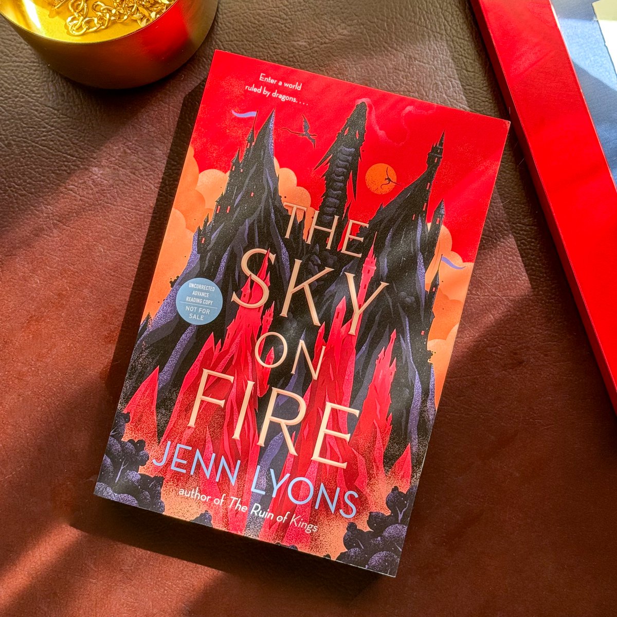 Who's ready for a #sweepstakes?! Today, we're giving YOU the chance to win an ARC of #TheSkyonFire by @jennlyonsauthor! 🔥✨ Follow, like, and repost to enter! Good luck! ⁣⁣⁣ #SkyonFireSweeps
