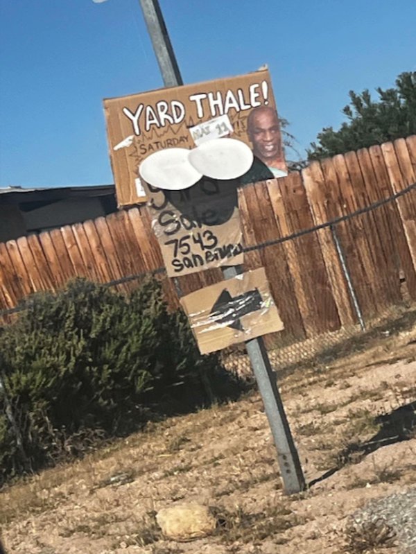 I'd pay money to see Tyson go to one of these garage sales and yell, who the fuck made that sign.