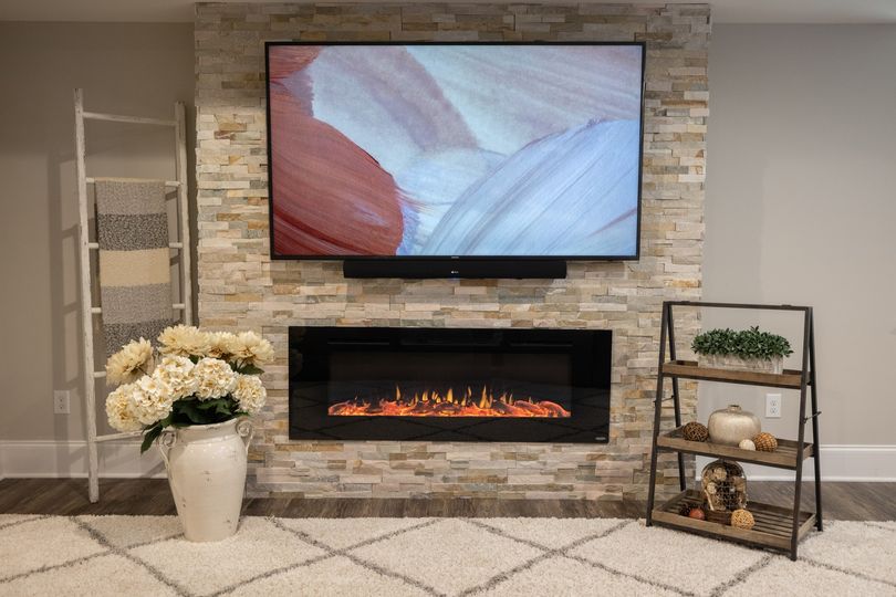 Why a Touchstone Electric Fireplace is the Best Choice For a Finished Basement 1. Versatile installation. Wall insert and wall mount models can be added during construction or years later for a room refresh. 2. Takes the chill off. Big basements can be drafty. The built-in heater