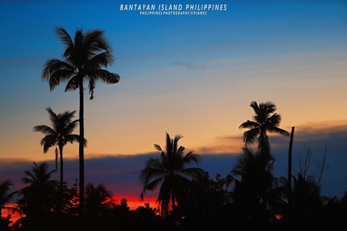 Island Life Sunset Therapy: Fire Raspberry Red sunset on the horizon, against a subtle Blue Sky evening: Bantayan Island Cebu, The Philippines. #ThePhotoHour #travelphotography #IslandLife #bantayanisland #bantayan #photography #StormHour #ShotOnCanon @TourismPHL #weather