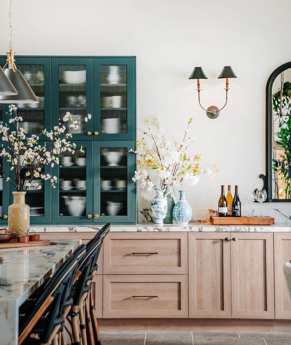 Color or wood in a kitchen?

We’re partial to two-tone. 

Especially love mixing color and woodgrain (wood always on the bottom to keep things grounded and not top-heavy).

Claire Thomas design/photo.