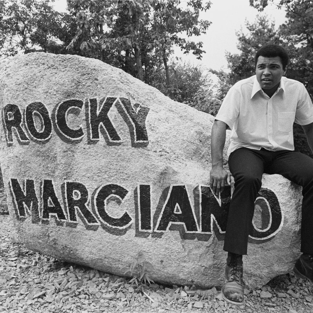 At Deer Lake, Ali introduced an homage to boxing's past, importing massive boulders and having his father paint the names of revered fighters on them. 

#MuhammadAli #Icon #DeerLake #HomageToGreats #BoxingTradition #LegacyInStone #RespectAndLegacy