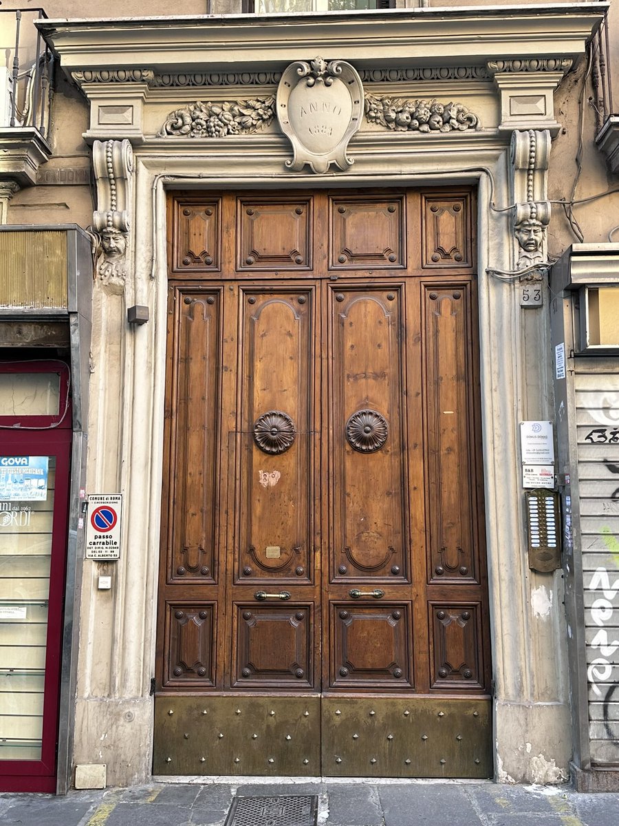 A doorway in Rome. Yes it functions, but they cared enough to make it beautiful also.