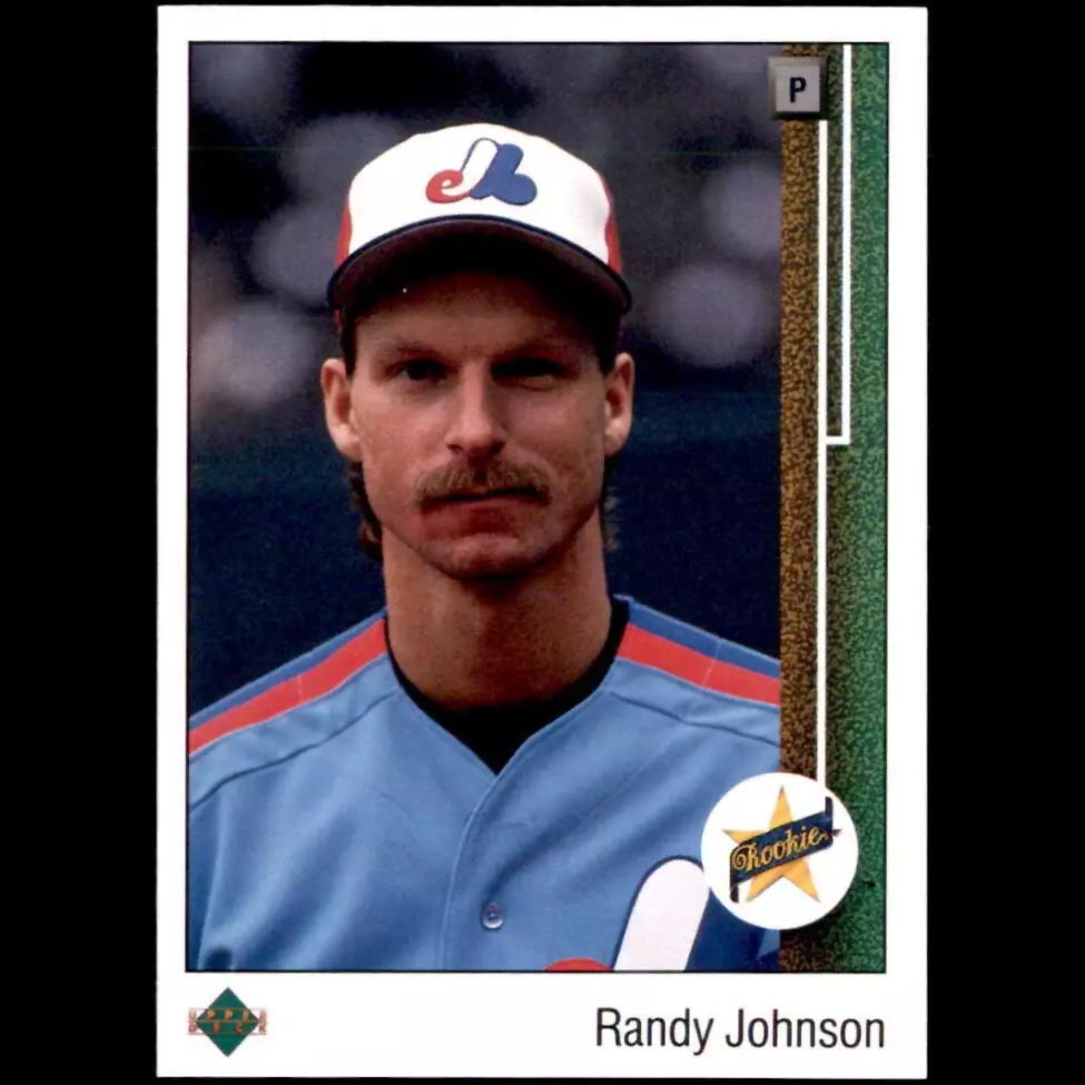 RepackedWax's tweet image. 1. Arguably, the 1989 #UpperDeck #RandyJohnson rookie should be on par with #KenGriffeyJr as the most valuable and sought after card in the set! Johnson's 5 #CyYoung awards put him in an elite class of player that even Griffey can't equal.