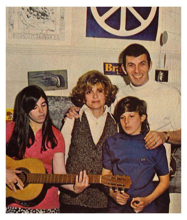 Though I'm getting distracted after having been with the photographer for hours, I really love this family photo. It's our '70s look. The blue Hang Ten T-Shirt I'm wearing is pure vintage.