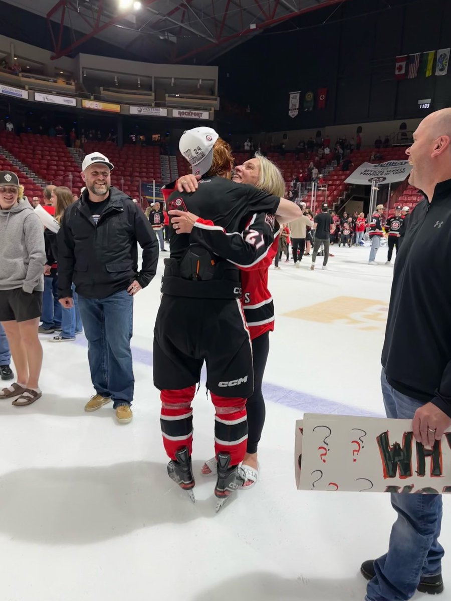 wfirkus's tweet image. Birthday hug on a history making night.  WHL champs!! #MooseJaw Warriors