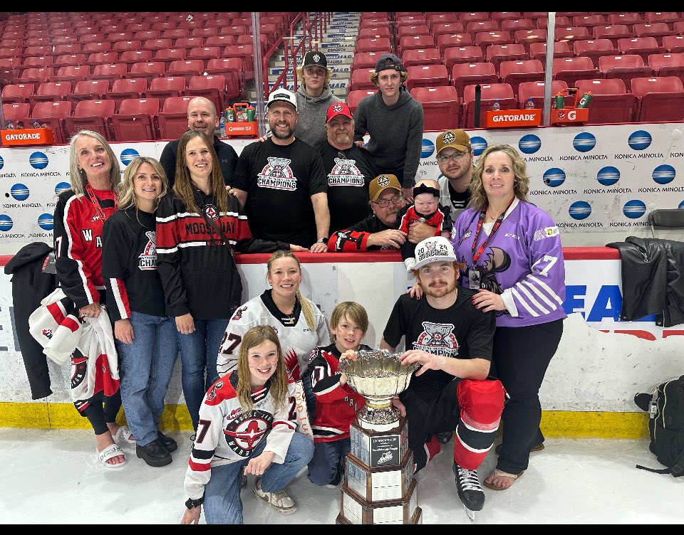 wfirkus's tweet image. Birthday hug on a history making night.  WHL champs!! #MooseJaw Warriors