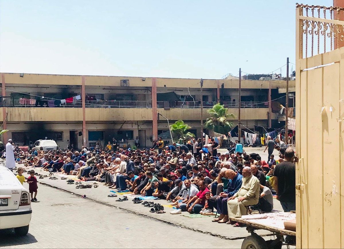 Despite the nonstop Israeli shelling and military invasion, thousands of displaced Palestinians in Jabalia refugee camp gather for Friday prayer.