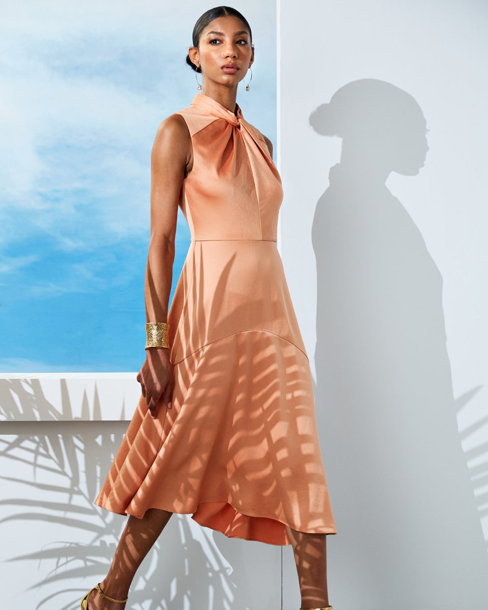 ElieTahari's tweet image. Twist into summer with our Twist Neck Satin Dress! It's chic, it's stylish, and it's ready to take your summer look to the next level. 🧡💜 #summerstyle #summerdress #weddingguestdress