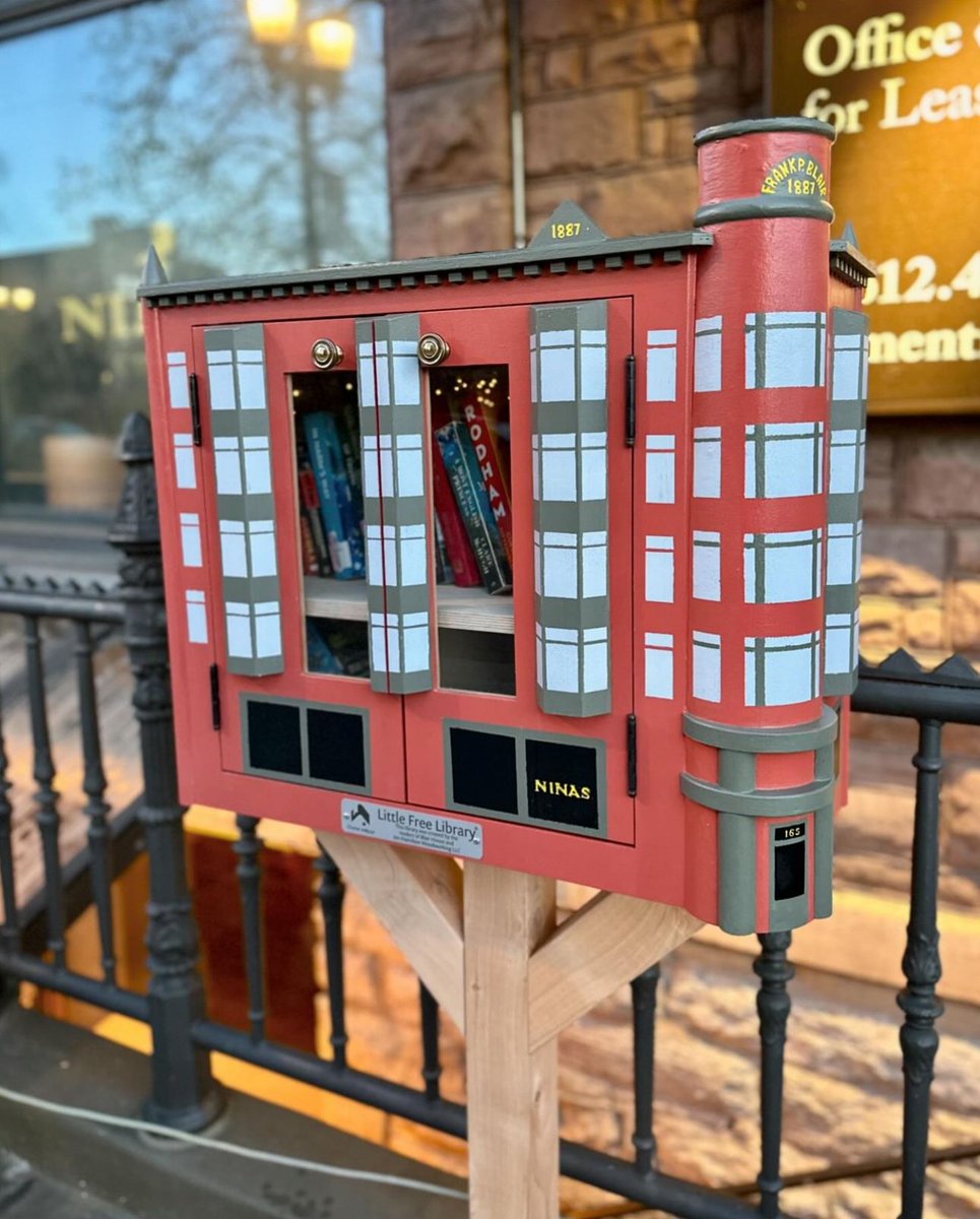 The Library of the Day is at Nina's Coffee Cafe, one of our favorite local coffee shops in St. Paul! The adorable book-sharing box on Western Ave N. is a miniature replica of the building that houses the café ☕ Find a Little Free Library near you: lflib.org/app