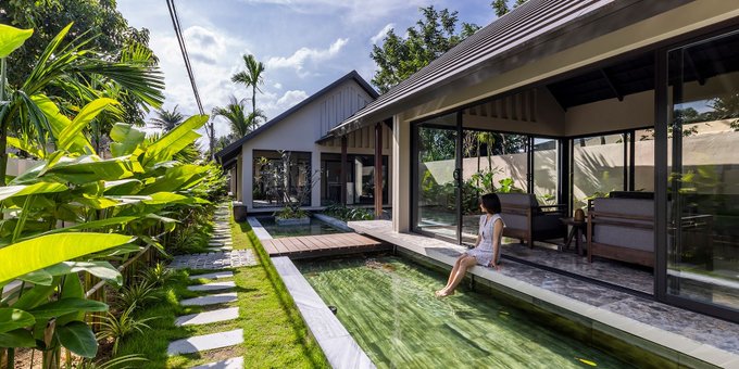 RT @designboom five intertwined gable roofs top pham huu son architects' h.a garden house in vietnam buff.ly/4dqUal9
