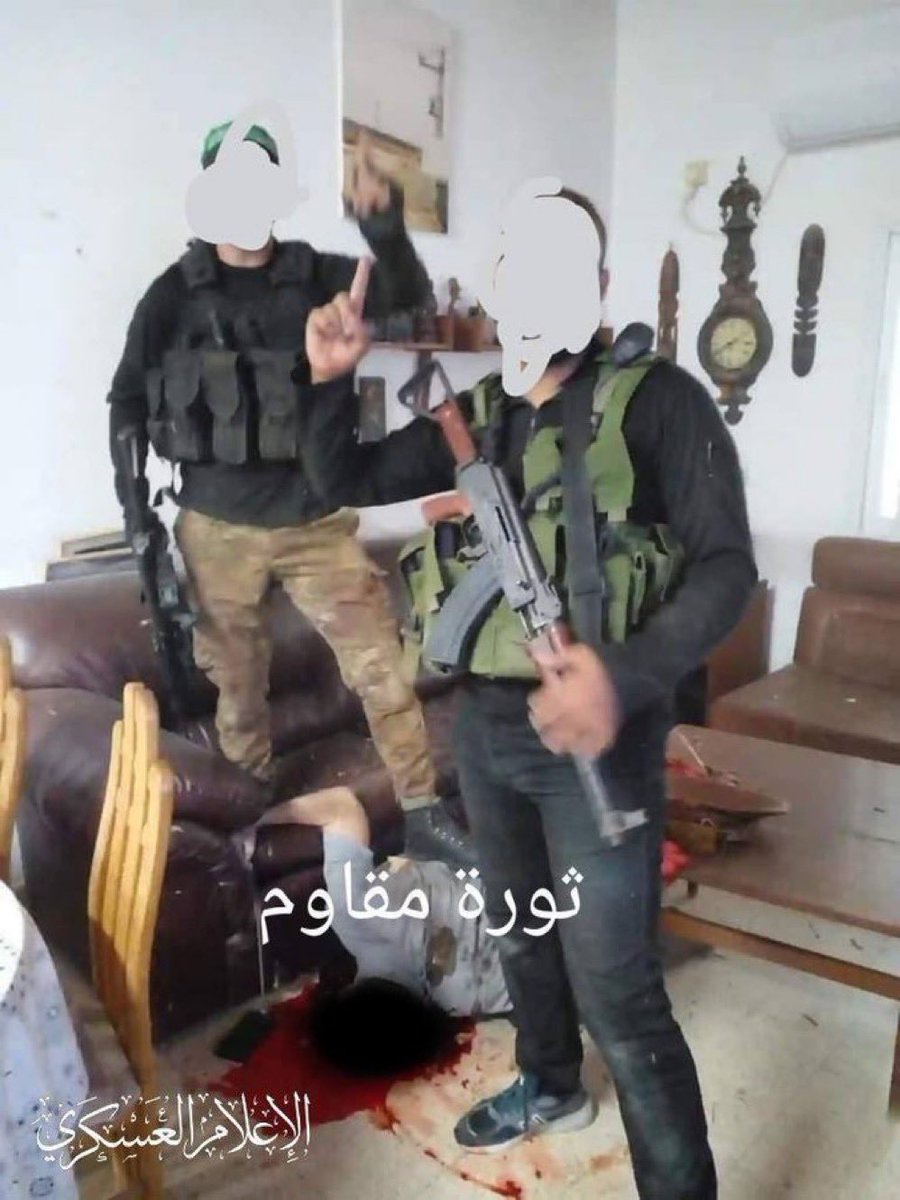 ⚠️ WARNING: Disturbing image This is from October 7. They murdered a civilian in his home, stepped on his dead body, and posed for a photo. This is Hamas.