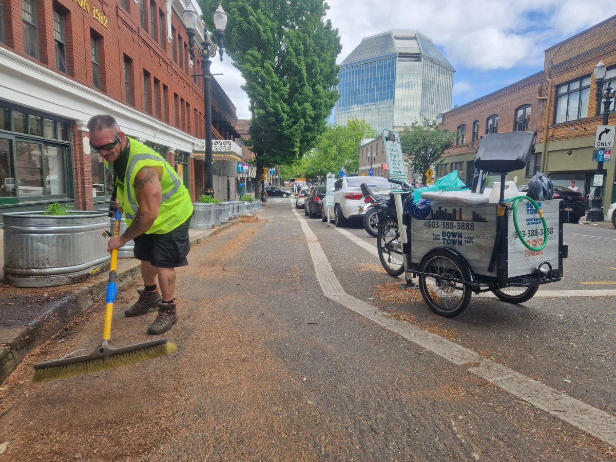 Big thanks to Rob from <a href="/inDowntownPDX/">Downtown Portland</a> for taking the time to hand sweep the 2nd Ave Protected Bike Lane in Old Town! <a href="/BikePortland/">BikePortland</a>