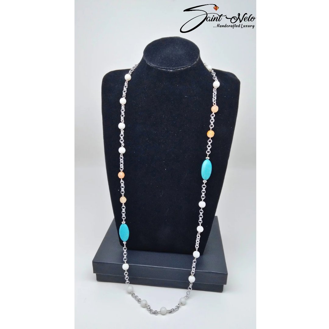 Embrace the vibrant spirit of June with our stunning necklace, infused with turquoise blue beads. Perfect for the 9-5 woman, this piece adds a pop of color and elegance to your everyday style. #SaintNelo #JuneJewelry #TurquoiseElegance #OfficeChic