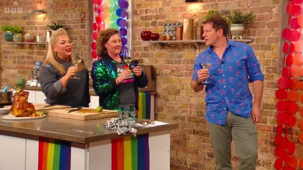 A burst of tropical fruit in a glass says <a href="/knackeredmutha/">Helen McGinn</a> on <a href="/SaturdayKitchen/">SaturdayKitchen</a> for <a href="/samandshauna/">samandshauna</a>'s BBQ pineapple chicken on #SaturdayKitchen #PrideMonth #HappyPrideMonth 🏳️‍🌈🏳️‍🌈 womeninthefoodindustry.com/sam-shauna-of-…