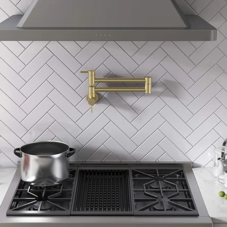 Pot fillers over the stove are stupid status symbols. I know... let's put a faucet with NO drain directly over a 20k appliance. Why??? Are you really cooking that much pasta?